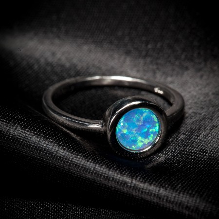 Серебряное кольцо с голубым опалом геометрия