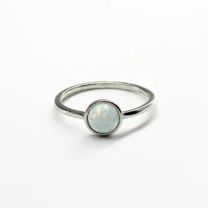 Срібна каблучка з білим опалом родована