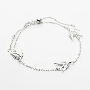Cрібний браслет з ластівками